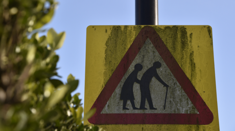 A street sign warning road users to be aware of elderly people is seen in London, Britain March 4, 2016. © REUTERS/Toby Melville