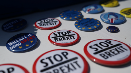 Anti-Brexit badges are seen on display in London, Britain June 26, 2019. © REUTERS/Hannah McKay