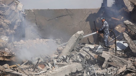 A Syrian firefighter inside the destroyed Scientific Research Center in Damascus, Syria April 14, 2018 © Omar Sanadiki