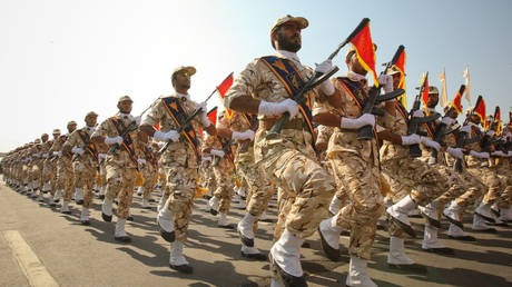Members of the Iranian revolutionary guard march during a parade.