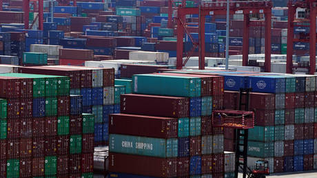 Containers are seen at the Yangshan Deep Water Port in Shanghai, China August 6, 2019.