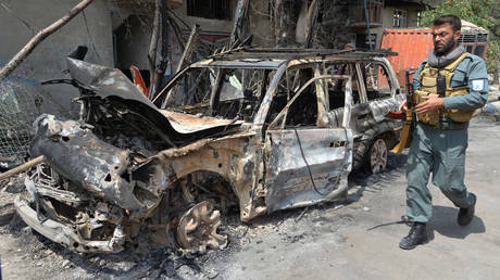 A member of Afghan security forces walk at the site of an attack in Kabul. ©Noorullah Shirzada / AFP