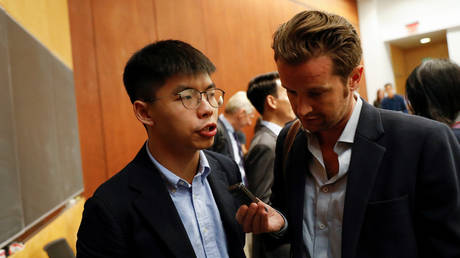 Hong Kong's pro-democracy activist Joshua Wong speaks to a reporter after a panel discussion on Anti-Extradition Law Movement in Hong Kong at Columbia University Law School in New York City, U.S., September 13, 2019. © REUTERS/Shannon Stapleton