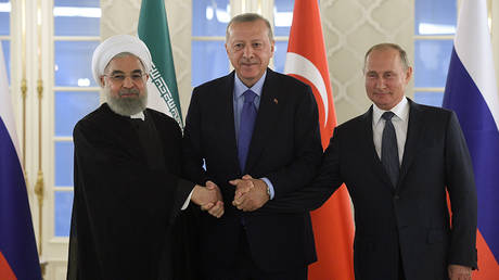 Presidents Vladimir Putin of Russia, Hassan Rouhani of Iran and Tayyip Erdogan of Turkey pose for a picture during their meeting in Ankara, Turkey September 16, 2019. © Sputnik/Valery Melnikov/Kremlin via REUTERS
