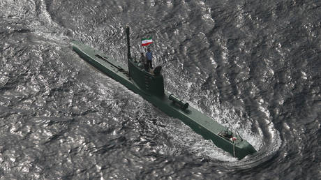 A Ghadir-class submarine sailing during an Iranian navy drill in the Gulf of Oman, on February 22.