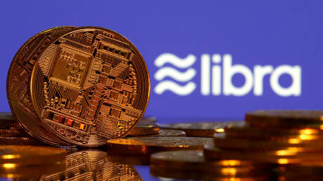 Representations of virtual currency are displayed in front of the Libra logo in this illustration picture, June 21, 2019.