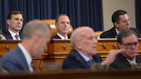 United States Representative Adam Schiff (Democrat of California) listens to the testimony of Deputy Assistant U.S. Secretary of State George Kent and Acting U.S. Ambassador to Ukraine William Taylor before the U.S. House Permanent Select Committee on Intelligence, November 13, 2019