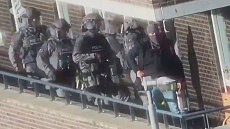 Dutch police special forces raid a house in Arnhem, Netherlands, September 27, 2018. Video grab via Reuters TV