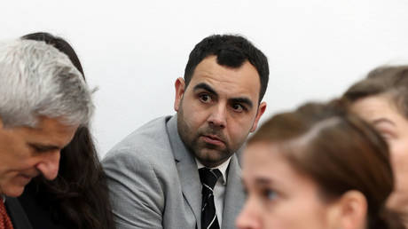 FILE PHOTO: Omar Shakir, HRW's Israel and Palestine Director at the district court in Jerusalem © Reuters / Ammar Awad