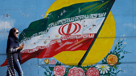 FILE PHOTO: A mural of the Iranian flag in Tehran © AFP