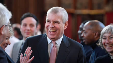 File photo: Prince Andrew (center) © REUTERS / Toby Melville