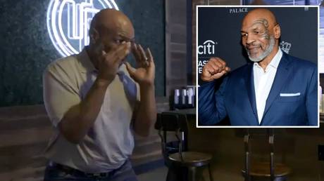 © Twitter / @MikeTyson | AFP / Noam Galai