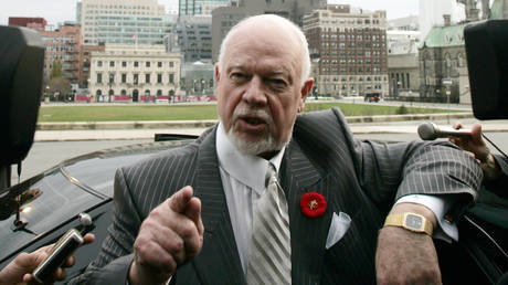 FILE PHOTO: Canadian hockey commentator Don Cherry speaks to journalists on Parliament Hill in Ottawa, on November 7, 2006.