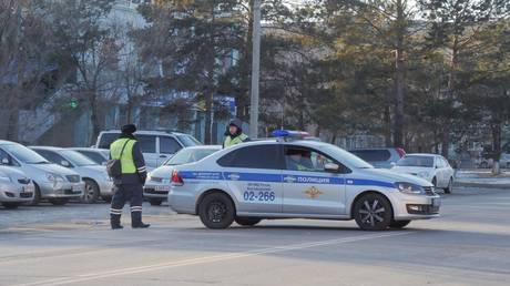 Police stand guard outside the shooting site © RIA Novosti / Yevgeny Zemtsov