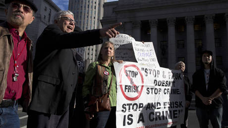 FILE PHOTO: People protest 'stop and frisk' policy outside of the Federal Court in New York City, US, on November 1, 2013.