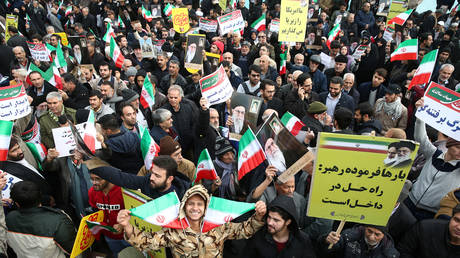 Iranian pro-government protesters attend a demonstration in Tehran, Iran November 25, 2019.