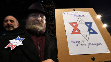 A protester marches against anti-Semitism in Marseille © AFP/ Boris Horvat