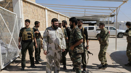 Members of Jaish al-Islam in the town of Soussian in Aleppo countryside, Syria September 23, 2018.  ©  REUTERS/Khalil Ashawi