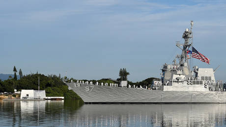 FILE PHOTO: US warships perform a ceremony honoring the 75th anniversary of the attack on Pearl Harbor at the Hickam base in Honolulu, Hawaii.
