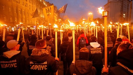 Supporters of Azov National Corps hold torchlight rally in Kiev, Ukraine, October 2017.
