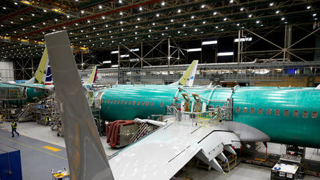 FILE PHOTO: A 737 Max aircraft is pictured at the Boeing factory in Renton, Washington, US, on March 27, 2019. 