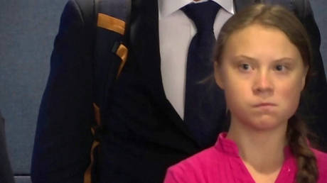 Swedish climate activist Greta Thunberg watches US President Donald Trump arrive at UNGA in New York, September 23, 2019