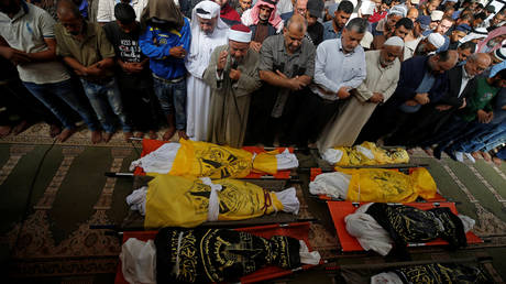 funeral for the Abu Malhous family © Reuters / Mohammed Salem
