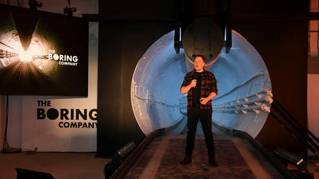 Elon Musk unveils a test tunnel of a proposed underground transportation network across Los Angeles County, in Hawthorne, California, U.S. December 18, 2018.