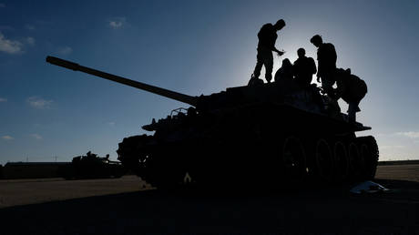 FILE PHOTO: Members of Libyan National Army (LNA), led by Khalifa Haftar, prepare to depart Benghazi to reinforce the troops advancing to Tripoli, Libya.