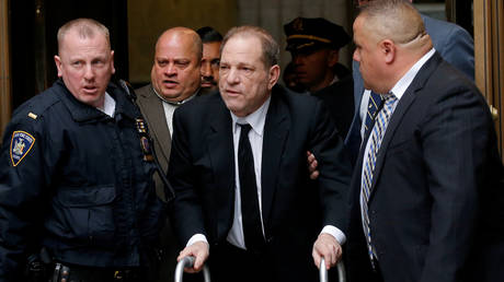 Weinstein (center) - truly diminished, or playing a role? © Reuters / Eduardo Munoz