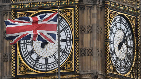 A union flag flies in front of the Great Clock of the Elizabeth Tower, more commonly referred to as 'Big Ben' © AFP / Justin Tallis