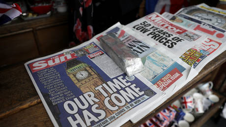 Newspapers and other souvenirs at a store near Parliament Square in London on Friday. © REUTERS/Simon Dawson