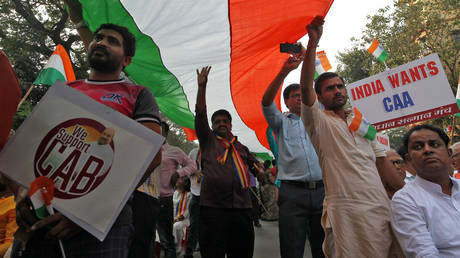 Indians rally in support of a new citizenship law, in Mumbai, India, December 27, 2019.