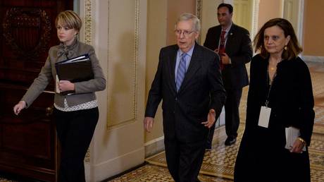 Senate Majority Leader Mitch McConnell (R-KY) walks to the Senate floor after a brief recess during the US President Donald Trump's Senate impeachment trial in Washington, January 31, 2020.