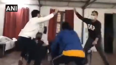 Saturday night fever? Indian students were filmed dancing the night away in quarantine. © ANI