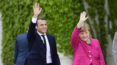 German Chancellor Angela Merkel and French President Emmanuel Macron © AFP / Tobias SCHWARZ