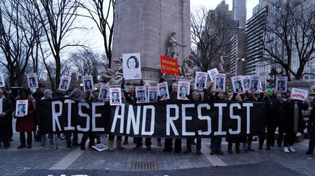 Demonstrators in New York protest the acquittal of President Donald Trump in his Senate impeachment trial, February 5, 2020.