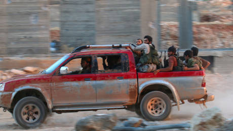 FILE PHOTO. Fighters of Jabhat Fateh al-Sham in southwestern Aleppo in 2016. ©REUTERS / Ammar Abdullah