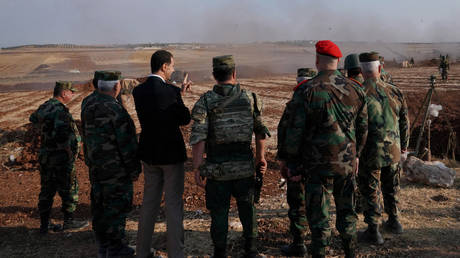 FILE PHOTO. Syrian President Bashar al Assad visits Syrian army troops in Idlib province. ©SANA / Handout via REUTERS