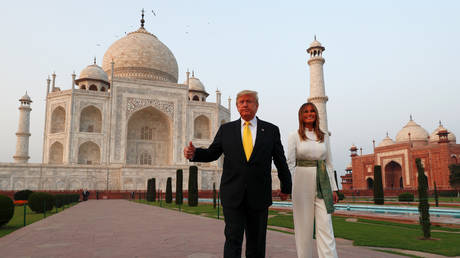 U.S. President Donald Trump gestures next to first lady Melania Trump as they tour the historic Taj Mahal, in Agra, India, February 24, 2020 © REUTERS/Al Drago