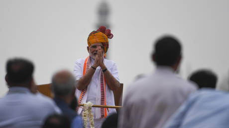 FILE PHOTO: India's Prime Minister Narendra Modi greets people during a ceremony to celebrate country's 73rd Independence Day in New Delhi, on August 15, 2019.