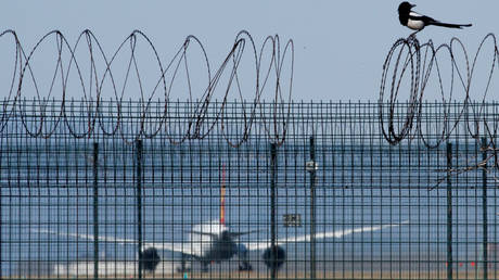 A fence surrounding Beijing Capital International Airport, China, March 13, 2020.