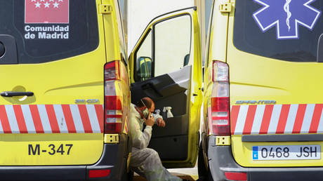 An ambulance driver outside the emergency unit at 12 de Octubre hospital in Madrid on Saturday. © REUTERS/Sergio Perez
