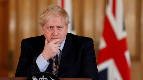 FILE PHOTO. Britain's Prime Minister Boris Johnson attends a news conference on the coronavirus.