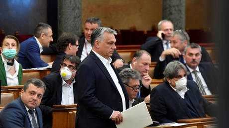 Hungarian PM Viktor Orban arrives at the Parliament in Budapest, March 30, 2020.