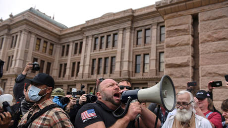 Alex Jones and others protest against Texas stay-at-home order to help slow spread of Covid-19 at Capitol building in Austin, Texas