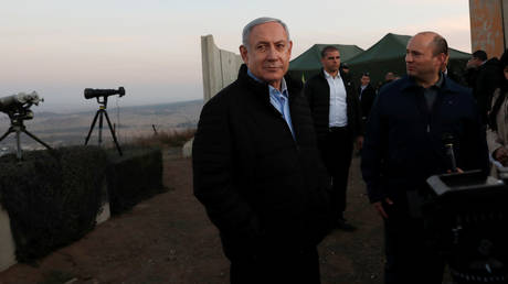Israeli PM Benjamin Netanyahu and his Defense Minister Naftali Bennett visit an Israeli army base in the Israeli-occupied Golan Heights, November 24, 2019. Atef Safadi / Pool
