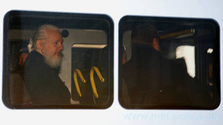 Assange pleads not guilty to failing to surrender to bail