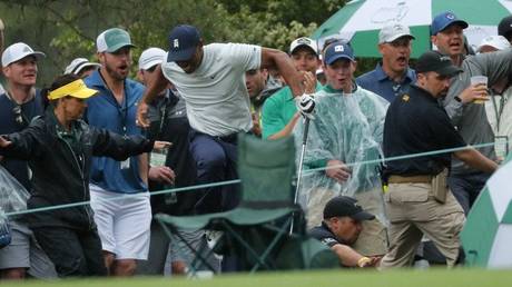 Easy, Tiger! Woods almost taken out by security guard in bizarre Masters incident (VIDEO)