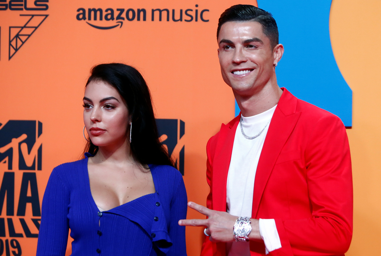 Cheeky! Cristiano Ronaldo gives girlfriend Georgina Rodriguez pat on the backside as pair wow fans at MTV Awards (PHOTOS)
